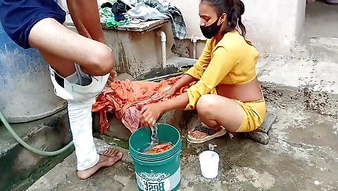 Stepsister wetting clothes while standing in the outdoor