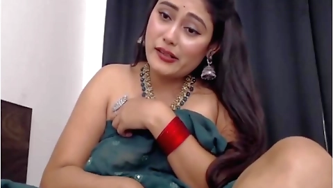 Indian girl with big tits masturbates on the webcam