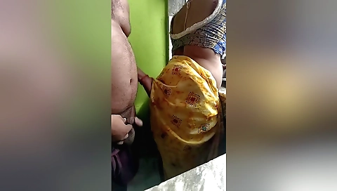 Indian teen with a cute face rubs a dick with her mouth