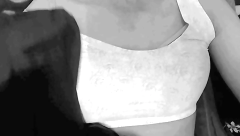 Solo female in a yellow hoodie and stockings enjoys a hot day