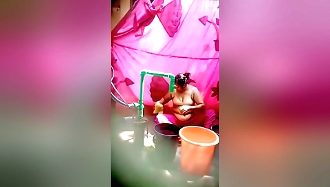 Indian hottie with big abs undresses in the bath room