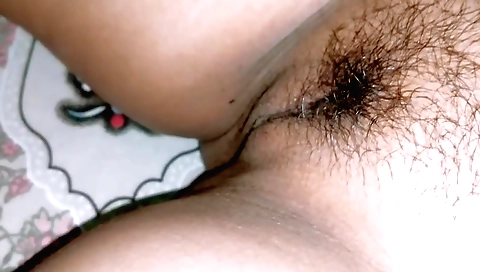 Indian girl with long legs and long thighs sucking on dildo