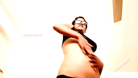 Busty brunette with small tits is dancing on the couch