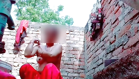 Indian brunette naked girl showing her shaved pussy