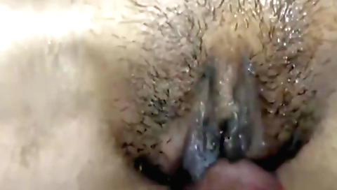Indian girl rubs her hairy pussy and gets hard in her cunt