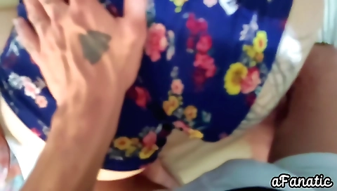 Hot blonde in a black dress is on the desk and rubbing her ass