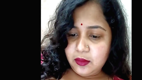 Busty Indian woman fucks herself in a sexy black dress