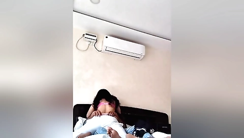 Amateur brunette 18+ girl with a nice body in a pink dress