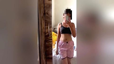 Busty brunette college student showing off her naked body