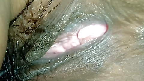 Indian girl with hairy pussy shows off on the table