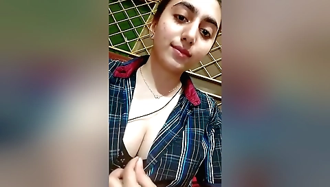 Busty brunette in homemade webcam show showing her body