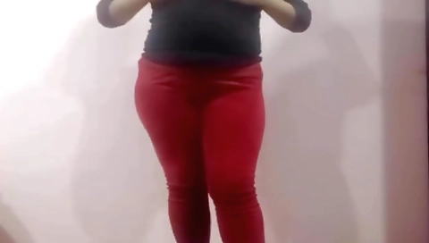 Busty brunette shows her juicy boobs and ass in one shot