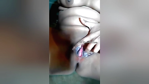 Sexy brunette chick with long legs teasing her pussy